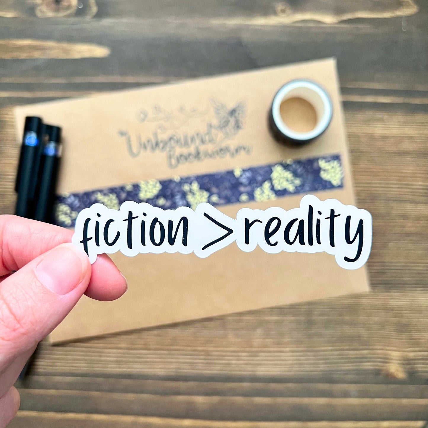 Fiction > Reality Sarcastic Bookish Sticker |