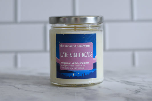Bergamot, Violet, & Amber scented bookish candle titled "Late Night Reads"