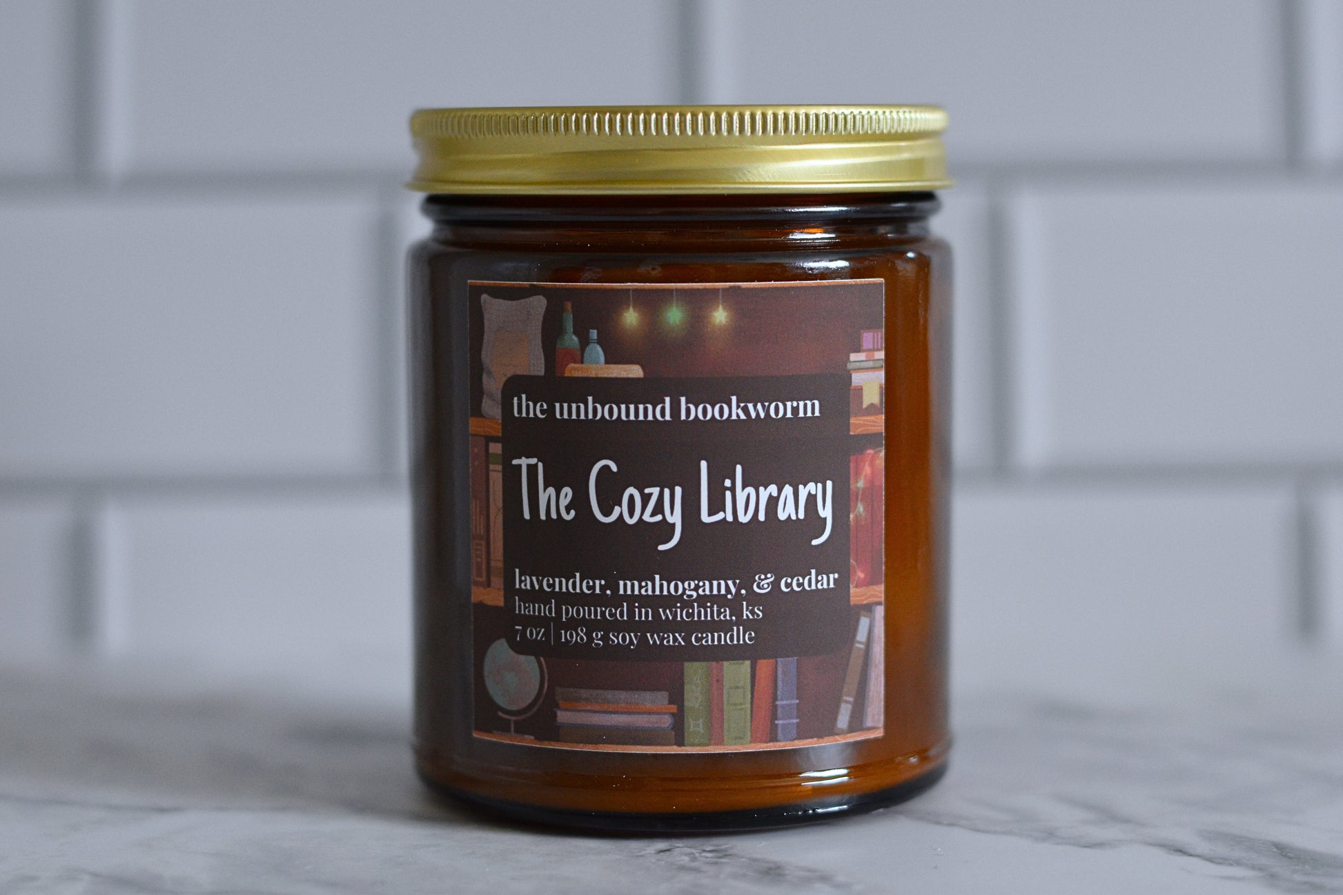 Lavender, mahogany, and cedar scented book candle titled "The Cozy Library"